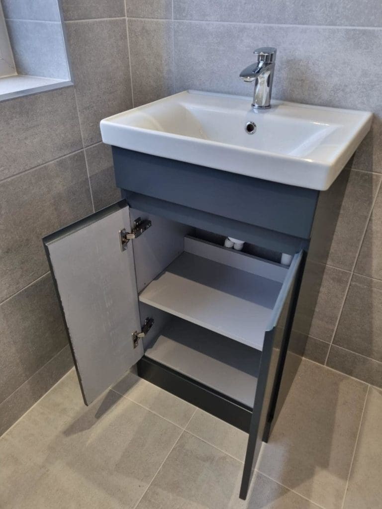 Bathroom basin with cabinet underneath
